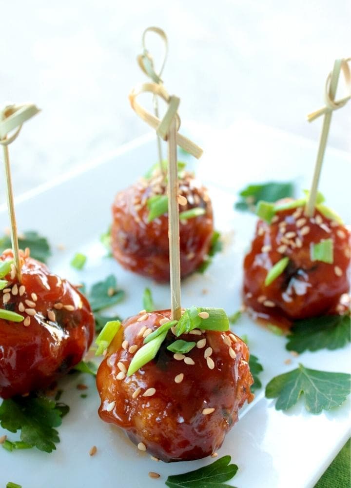 asian fish balls with sweet and sour sauce.