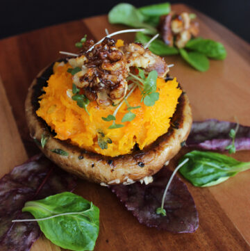 Portobello Mushroom with roasted Pumpkin mash and caramelized Walnuts - Seasonal, simple and super tasty. This vegetarian recipe features sweet roasted pumpkin and juicy portobello, for a meal that any meat-lover will love.