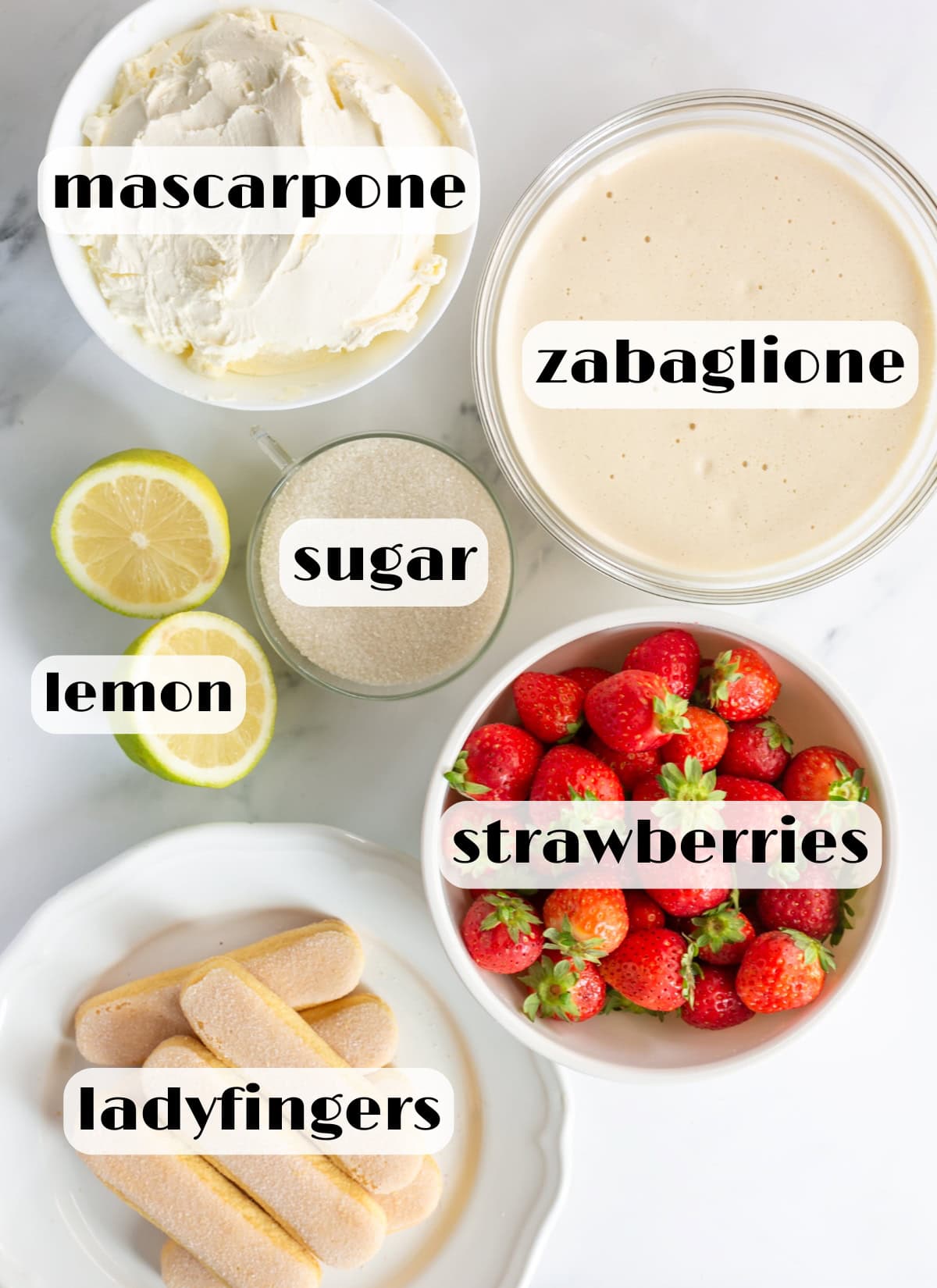 strawberry tiramisu ingredients: strawberries, mascarpone, zabaglione, ladyfingers, sugar and lemon.