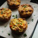 A crispy muffin filling of spicy chorizo and sweet pumpkin - a perfect way to start your morning on cold days. Super moist, packed with flavor, fast and easy! Recipe by The Petite Cook