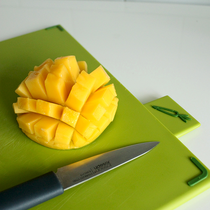 Joseph Joseph green chopping board for fresh fruits, vegetables and salad.