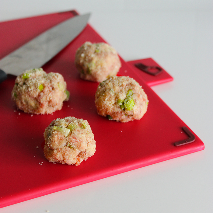 Joseph Joseph red chopping board for raw meat.
