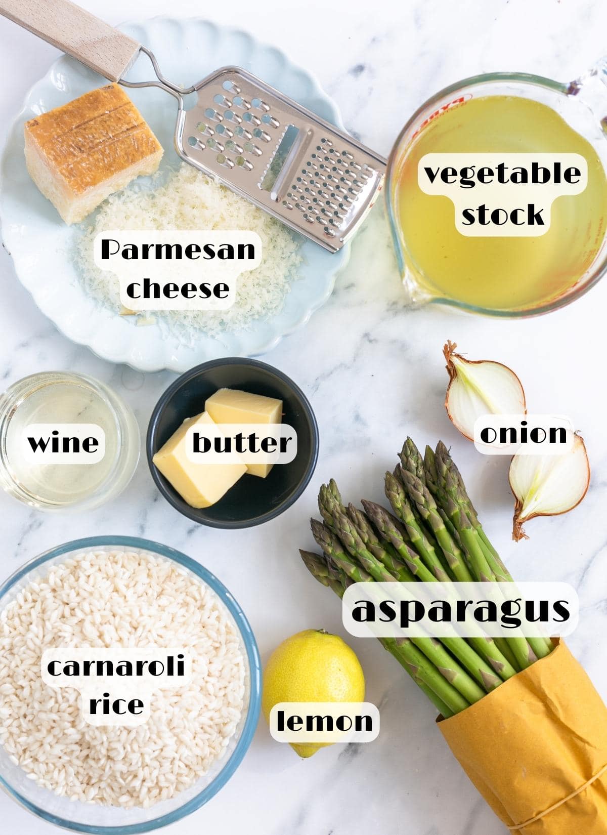 asparagus risotto ingredients: stock, parmesan, onion, butter, rice, asparagus, lemon, wine, butter.