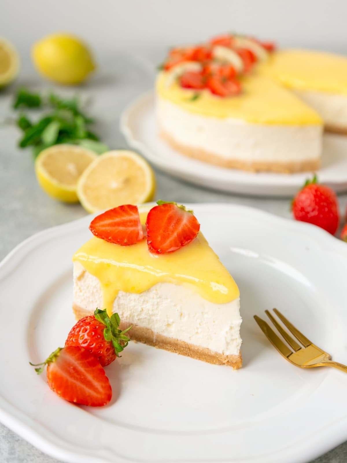 No bake yuzu cheesecake topped with yuzu curd and strawberries.