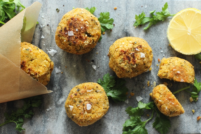 Healthy Awesome Baked Falafel- Golden-brown and crispy on the outside, fluffy melt-in-your-mouth and aromatic within, once you taste falafel it's impossible to live without - Vegetarian recipe by The Petite Cook