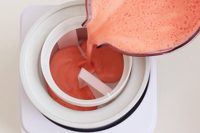 granita mixture poured in the bowl of an ice cream maker