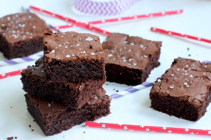 These melt-in-your-mouth healthy fudgy brownies are pure heaven in a bite. Plus they're gluten free and dairy free! Recipe by The Petite Cook