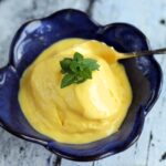 Easy Egg-free Mango Ice Cream is the best treat you can make to yourself on a hot summer day. Plus vegan option is also available.