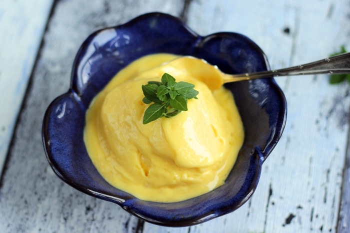 Easy Egg-free Mango Ice Cream is the best treat you can make to yourself on a hot summer day. Plus vegan option is also available.