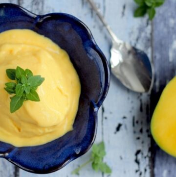 Easy Egg-free Mango Ice Cream is the best treat you can make to yourself on a hot summer day. Plus vegan option is also available.