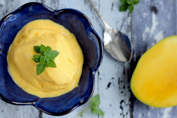Easy Egg-free Mango Ice Cream is the best treat you can make to yourself on a hot summer day. Plus vegan option is also available.