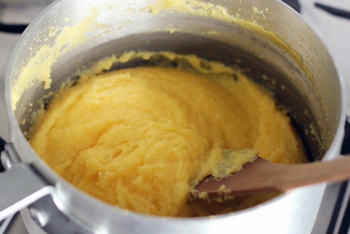 recipe step 1: cook the polenta in a heavy saucepan until rich, dense and cooked through