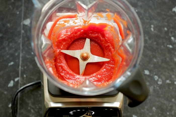 homemade ketchup ingredients mixed in a blender.