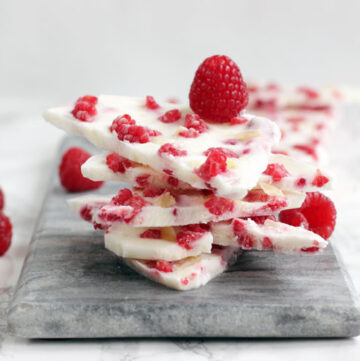 3-Ingredient Raspberry Yogurt Barks - Healthy enough for snacking around during the day, and delicious enough to be served as dessert, this is the ultimate guilt-free treat made to please both kids and grown-ups. Gluten-free Recipe by The Petite Cook