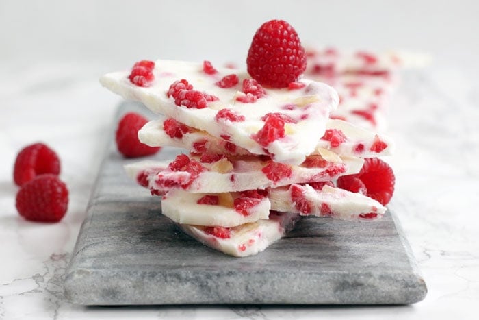 3-Ingredient Raspberry Yogurt Barks - Healthy enough for snacking around during the day, and delicious enough to be served as dessert, this is the ultimate guilt-free treat made to please both kids and grown-ups. Gluten-free Recipe by The Petite Cook