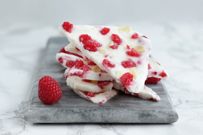 3-Ingredient Raspberry Yogurt Barks - Healthy enough for snacking around during the day, and delicious enough to be served as dessert, this is the ultimate guilt-free treat made to please both kids and grown-ups. Gluten-free Recipe by The Petite Cook