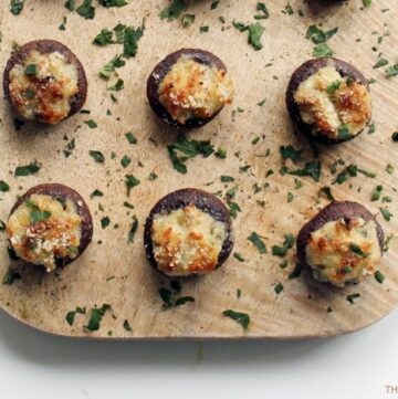 Easy Stuffed Mushrooms are such a classic and versatile appetizer for all occasions - especially holidays. But easy enough to prepare as a side dish for any day of the week. Plus they're gluten-free and dairy-free! Recipe from www.thepetitecook.com