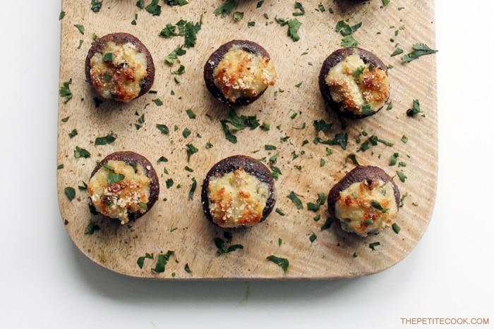 Easy Stuffed Mushrooms are such a classic and versatile appetizer for all occasions - especially holidays. But easy enough to prepare as a side dish for any day of the week. Plus they're gluten-free and dairy-free! Recipe from www.thepetitecook.com