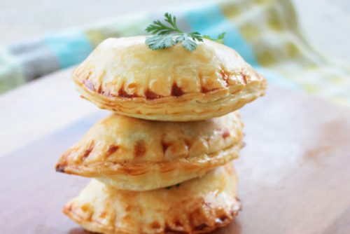 Delicious Empanadas with lamb and shiitake mushrooms that are easy to make with simple ingredients. These savory bites make a great holiday parties snack!