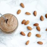 Homemade Almond Butter - Healthy, natural and made with just 1 ingredients and 15 mins of your time - Use this awesome vegan butter for toasts, cakes, pancakes or in smoothies ! Recipe from www.thepetitecook.com