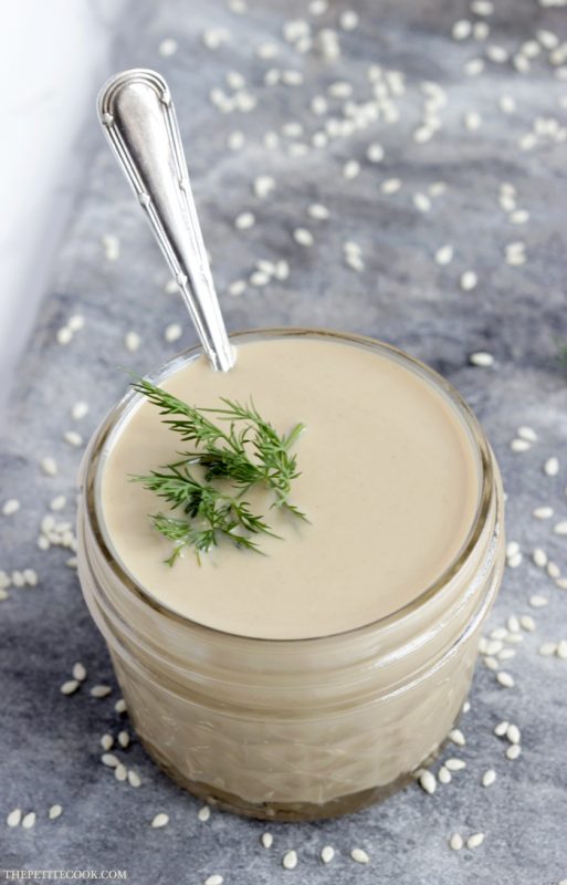 How To Make Tahini Sauce - Making your own homemade tahini sauce is easier than you think - You need only 2 ingredients to make a delicious sauce that will instantly upgrade all your healthy recipes. Vegan, Glutenfree and Dairyfree recipe by www.thepetitecook.com