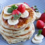 This Basic Buttermilk Pancakes recipe will help you recreate a weekend favorite in less than 10 minutes! Recipe from www.thepetitecook.com