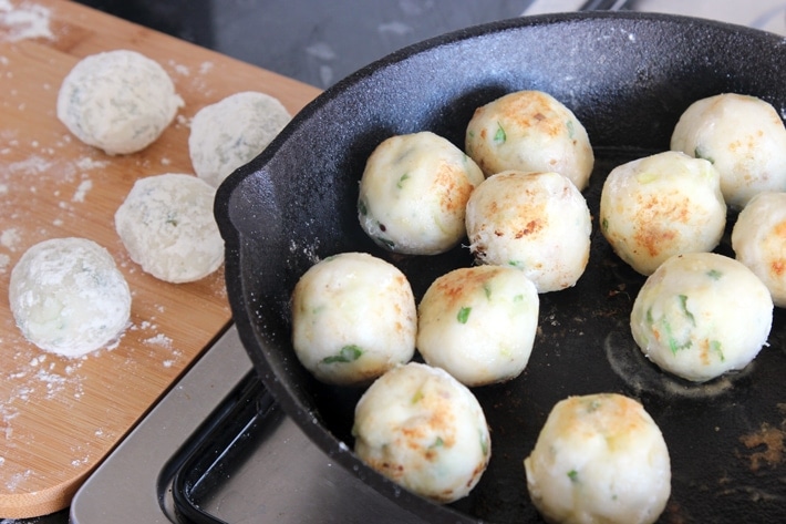 Sicilian Cod Meatballs make a delicious heathy family meal and are so easy to put together in just 30 min - Toss them with delicious homemade italian tomato sauce for authentic Mediterranean flavors delivered straight in your mouth! Recipe from www.thepetitecook.com