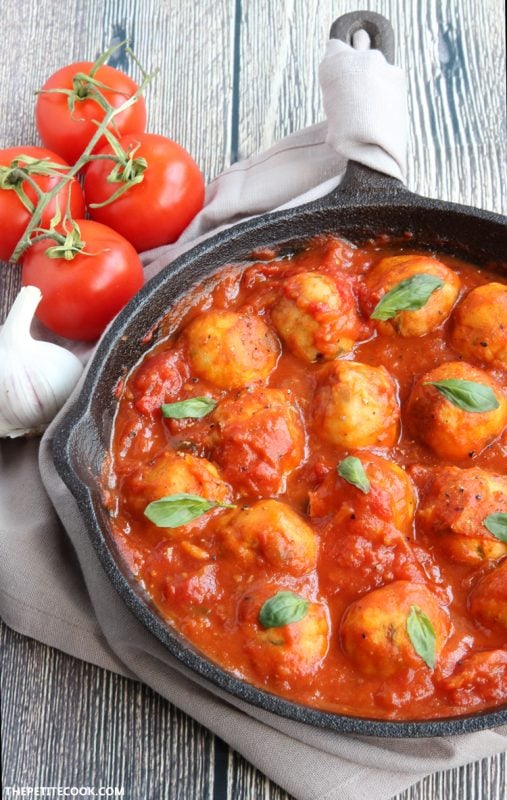 Sicilian Cod Meatballs make a delicious heathy family meal and are so easy to put together in just 30 min - Toss them with delicious homemade italian tomato sauce for authentic Mediterranean flavors delivered straight in your mouth! Gluten-free and dairy-free recipe from www.thepetitecook.com
