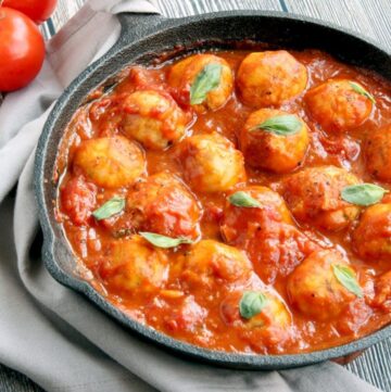 Sicilian Cod Meatballs make a delicious heathy family meal and are so easy to put together in just 30 min - Toss them with delicious homemade italian tomato sauce for authentic Mediterranean flavors delivered straight in your mouth! Gluten-free recipe from www.thepetitecook.com