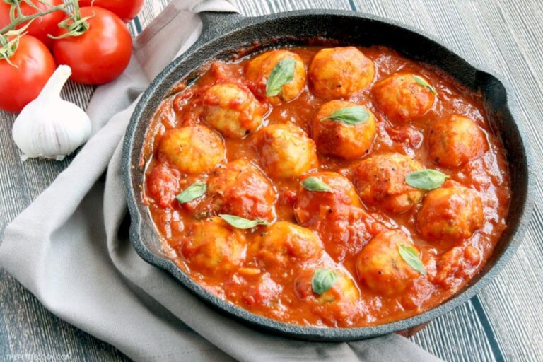 Sicilian Cod Meatballs make a delicious heathy family meal and are so easy to put together in just 30 min - Toss them with delicious homemade italian tomato sauce for authentic Mediterranean flavors delivered straight in your mouth! Gluten-free recipe from www.thepetitecook.com
