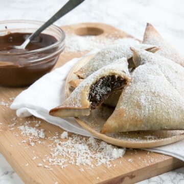 Nutella and coconut samosas served with melted chocolate on the side