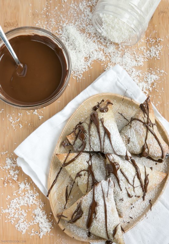 Nutella and coconut samosas served with melted chocolate on the side
