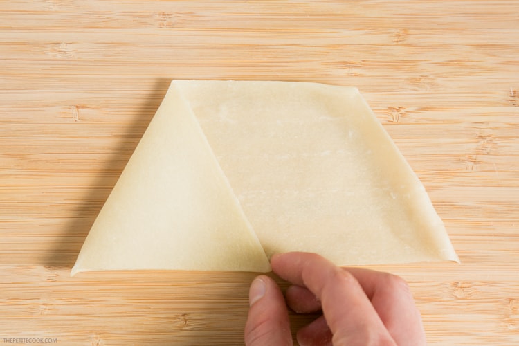 samosas recipe step 1: fold the pastry sheet using your hand, to form a triangle