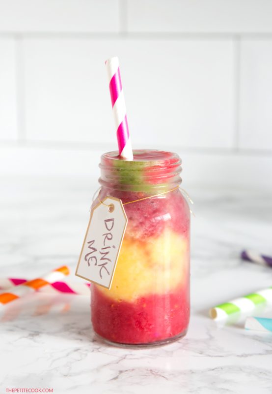 This vibrant #vegan Wonderland Smoothie is packed with vitamins and healthy goodness - A fun colourful addition to any Alice in Wonderland themed party. Recipe from www.thepetitecook.com