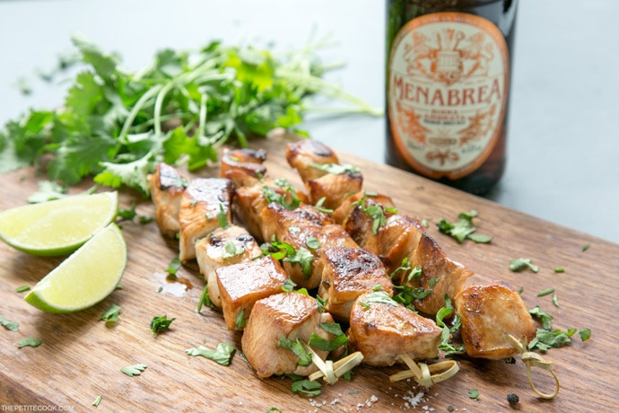 Juicy, tender, tangy, crispy, deliciously savory. These Beer Lime Chicken Skewers are a light but tasty addition to any BBQ party. And quick enough to be made during the work week for an easy fuss-free dinner option. Recipe from www.thepetitecook.com