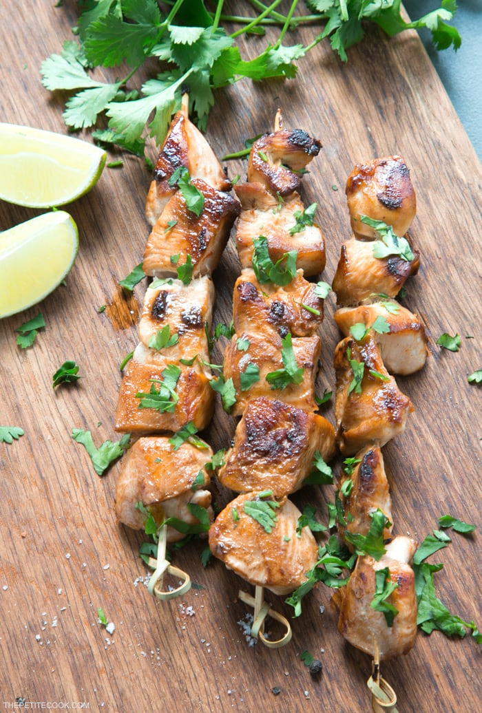 Juicy, tender, tangy, crispy, deliciously savory. These Beer Lime Chicken Skewers are a light but tasty addition to any BBQ party. And quick enough to be made during the work week for an easy fuss-free dinner option. Recipe from www.thepetitecook.com