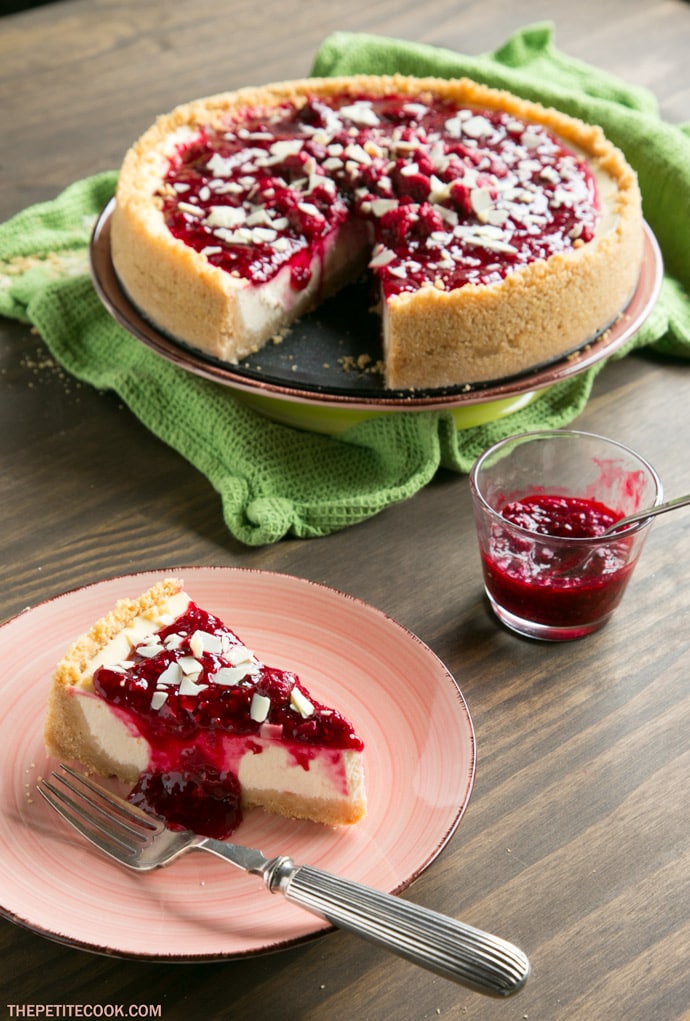 Sweet and tangy flavors combine beautifully to make one of the most iconic desserts ever - This New York style Raspberry Cheesecake is pure heaven in a bite! Recipe from www.thepetitecook.com