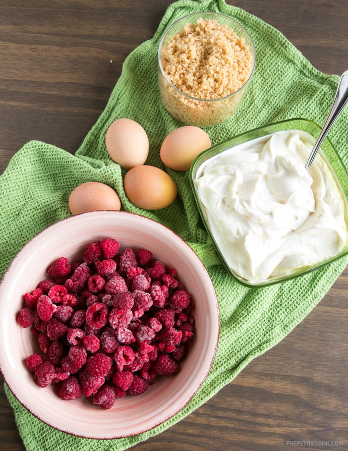 Sweet and tangy flavors combine beautifully to make one of the most iconic desserts ever - This New York style Raspberry Cheesecake is pure heaven in a bite! Recipe from www.thepetitecook.com