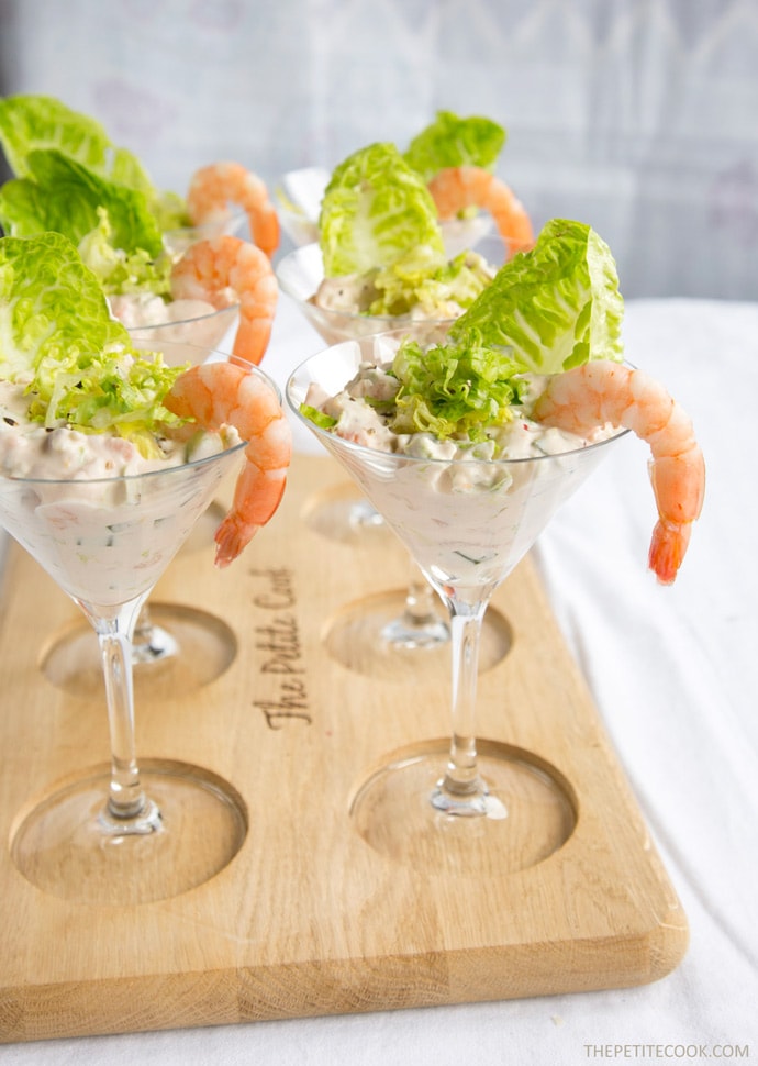 A healthy take on a British classic, this quick gluten-free no-mayo Salmon and Prawn Cocktail is the perfect starter for all the seafood lovers out there! Recipe from The Petite Cook - www.thepetitecook.com