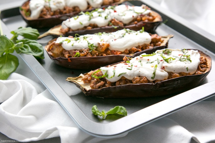 These lighten-up easy Moussaka Stuffed Eggplants bring a traditional Greek recipe to a whole new level - Easy to make, gluten-free and ready in just 30 min. Recipe by The Petite Cook www.thepetitecook.com