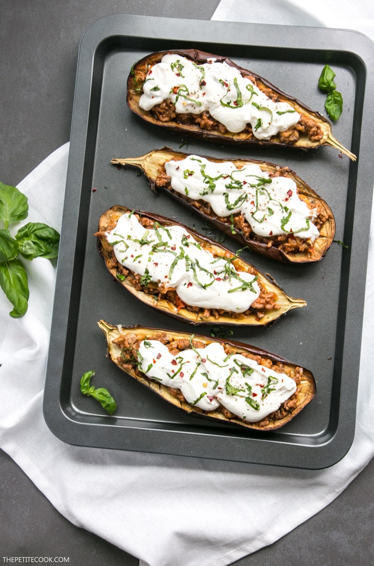 These lighten-up easy Moussaka Stuffed Eggplants bring a traditional Greek recipe to a whole new level - Easy to make, gluten-free and ready in just 30 min. Recipe by The Petite Cook www.thepetitecook.com