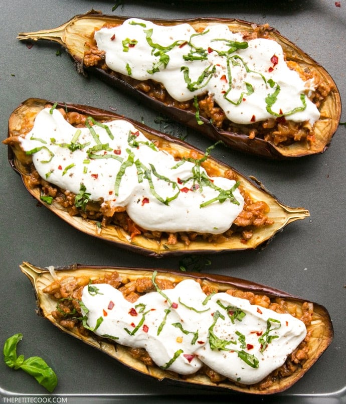 These lighten-up easy Moussaka Stuffed Eggplants bring a traditional Greek recipe to a whole new level - Easy to make, gluten-free and ready in just 30 min. Recipe by The Petite Cook www.thepetitecook.com