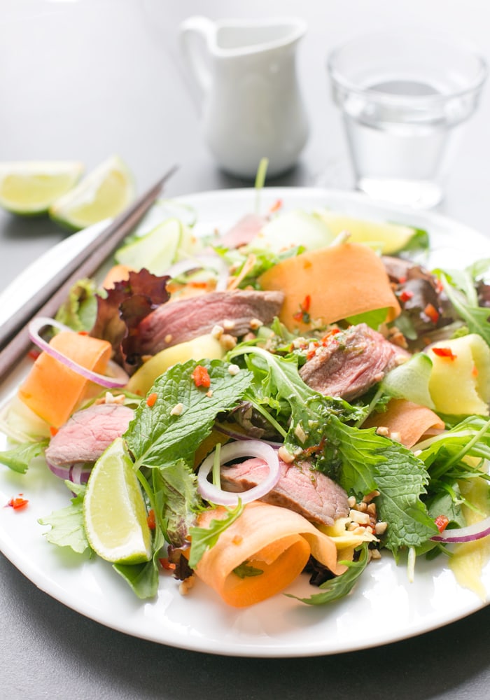 Bursting with flavors, this gluten-free Asian Beef Salad is ready in just 15 min and loaded with protein-rich beef, healthy veggies and fresh herbs - The perfect balanced meal to enjoy on a busy day!