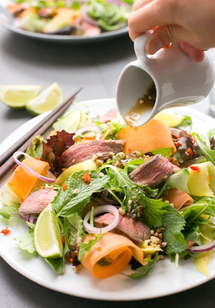 Bursting with flavors, this gluten-free Asian Beef Salad is ready in just 15 min and loaded with protein-rich beef, healthy veggies and fresh herbs - The perfect balanced meal to enjoy on a busy day!
