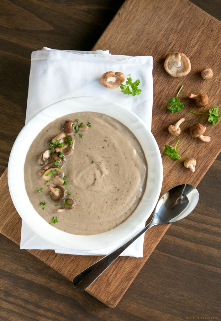 You'll never go back to the canned stuff once you try this super easy Homemade Cream of Mushroom Soup - Ready in just 20 min, vegetarian and with tons of flavor, it's the best soup EVER! Recipe by The Petite Cook - www.thepetitecook.com