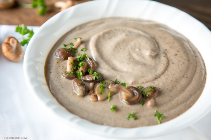 You'll never go back to the canned stuff once you try this super easy Homemade Cream of Mushroom Soup - Ready in just 20 min, vegetarian and with tons of flavor, it's the best soup EVER! Recipe by The Petite Cook - www.thepetitecook.com