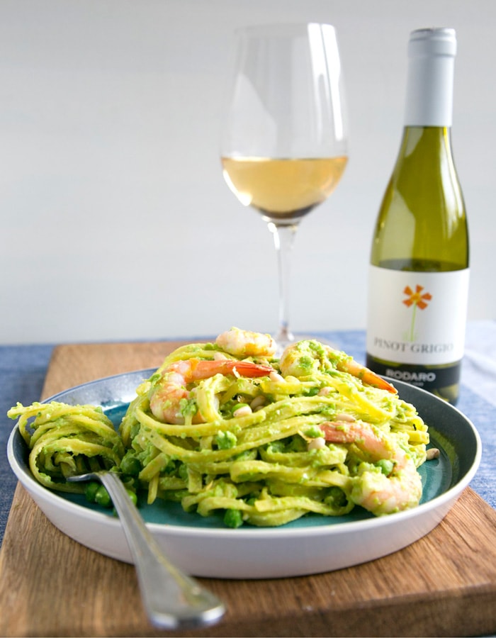 Looking for a light dairy-free pasta recipe to enjoy all spring long? Look no further! This quick Pea Pesto Pasta with Prawns is sure to become a favorite meal this season! Recipe by The Petite Cook