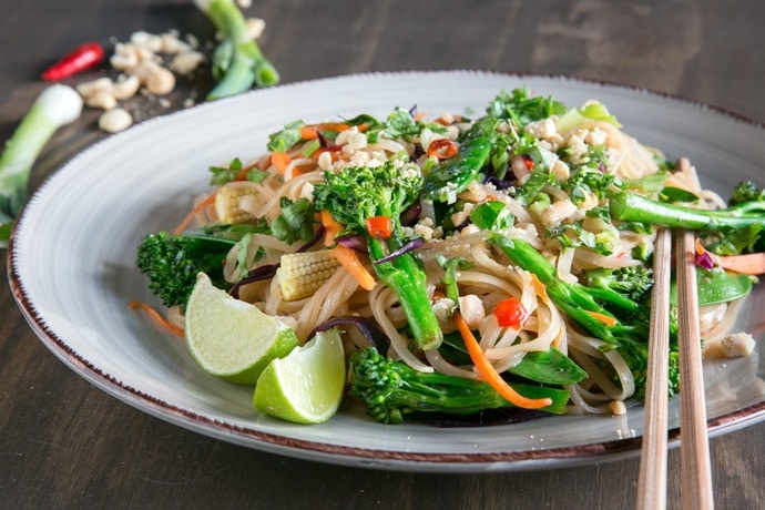 The Easiest Vegan Pad Thai EVER! Ready in less than 30min, naturally gluten-free and easy to customize with your favorite veggies! Recipe from The Petite Cook - www.thepetitecook.com
