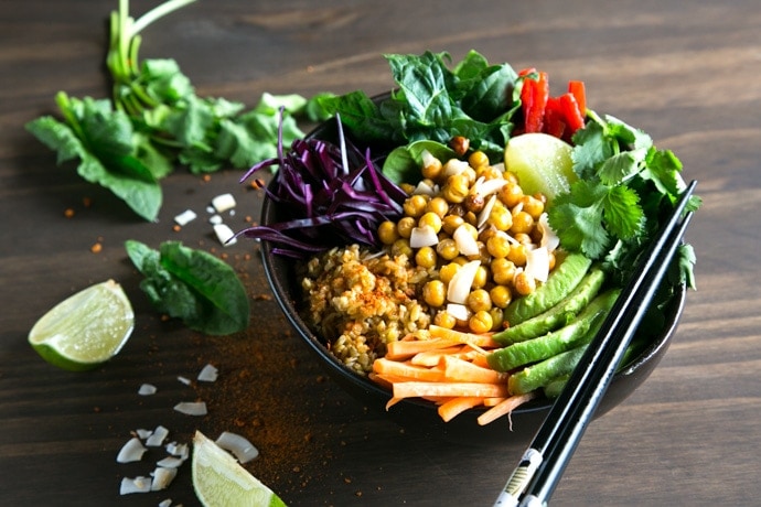 Full of greens, fiber and protein this vegan Spicy Chickpea Freekeh Buddha Bowl is the ultimate healthy lunch or dinner. It’s ready in 30 minutes and packed with fresh flavors! Recipe from The Petite Cook