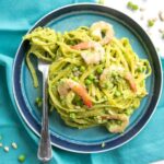 Looking for a light dairy-free pasta recipe to enjoy all spring long? Look no further! This quick Pea Pesto Pasta with Prawns is sure to become a favorite meal this season! Recipe by The Petite Cook